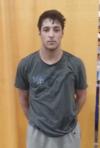 STEVE MILLAR / ILLINOIS MATMEN Anthony Cheloni after winning CCL title